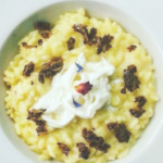 Risotto allo zafferano e tartufo nero, mantecato con burrata di bufala